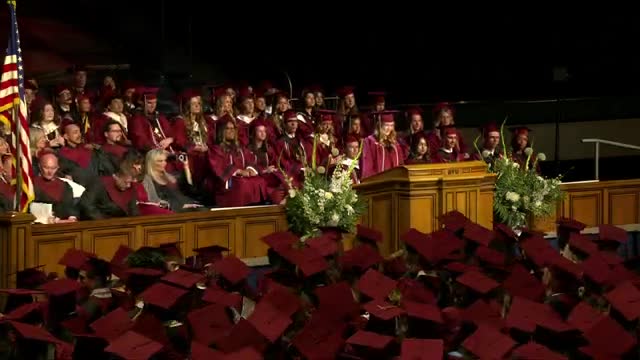 Cedar Valley graduates celebrate with principal Courtney Johnson at commencement ceremony
