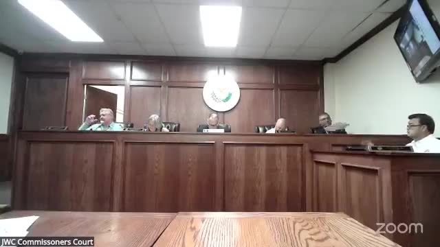 Commissioners certify $21,765.60 from asset sale for Road & Bridge equipment purchase