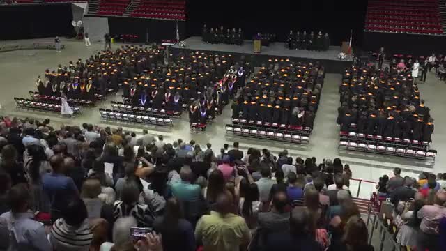 Ames High School celebrates 140th commencement with national anthem performance