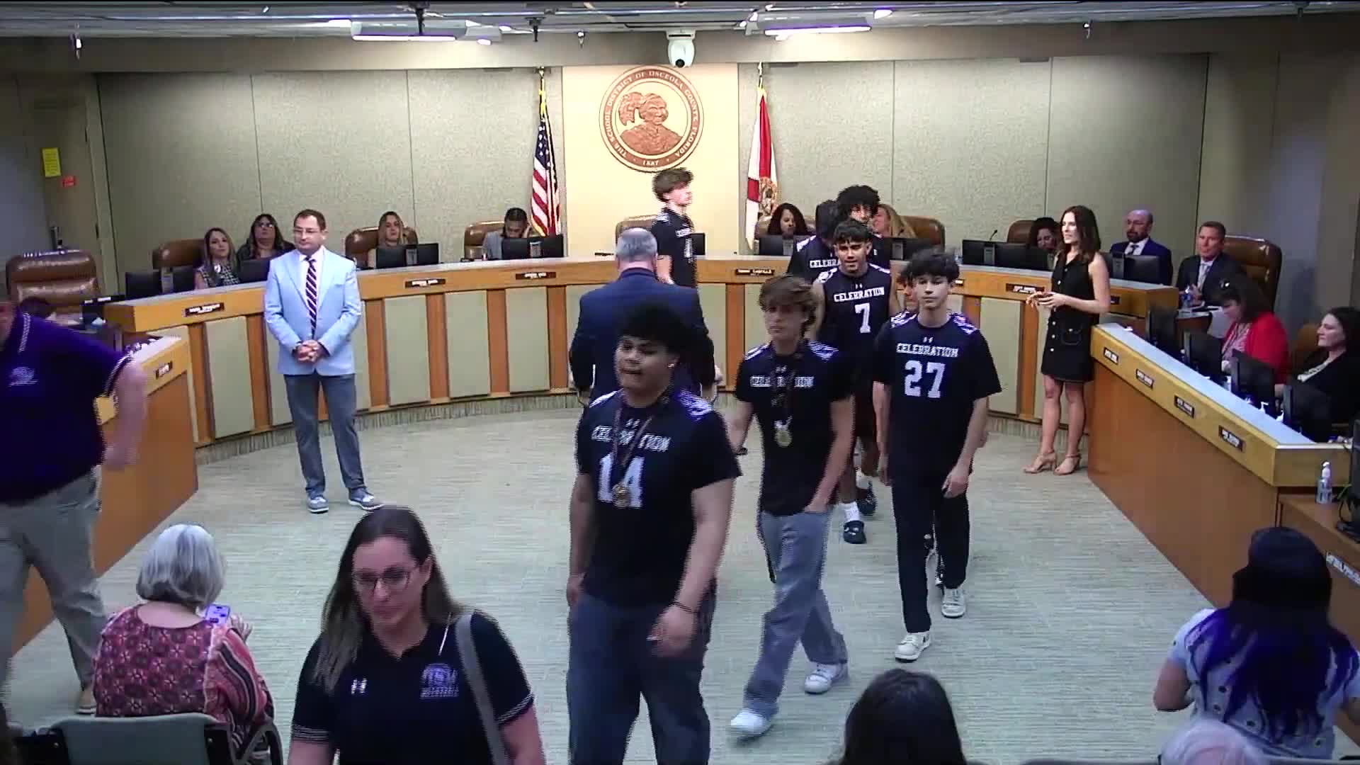 Harmony School District honors coach Heath Williams and bus driver Vicky Turosi