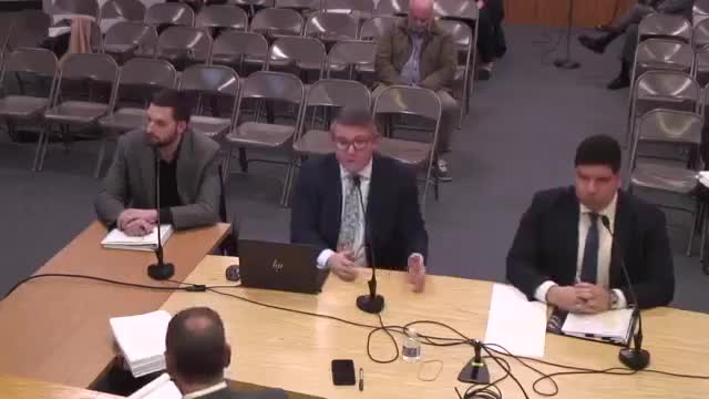 City Council debates residential building plan with income-restricted units and parking concerns