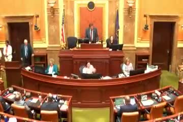 Gabrielle Clark leads prayer at special session with Sandra Hollins pledging allegiance