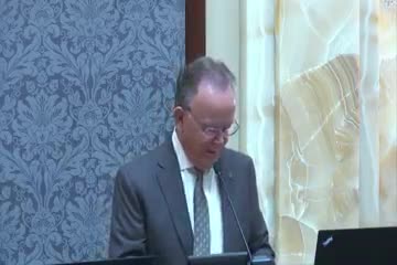 Community leader prays for workforce support and unity