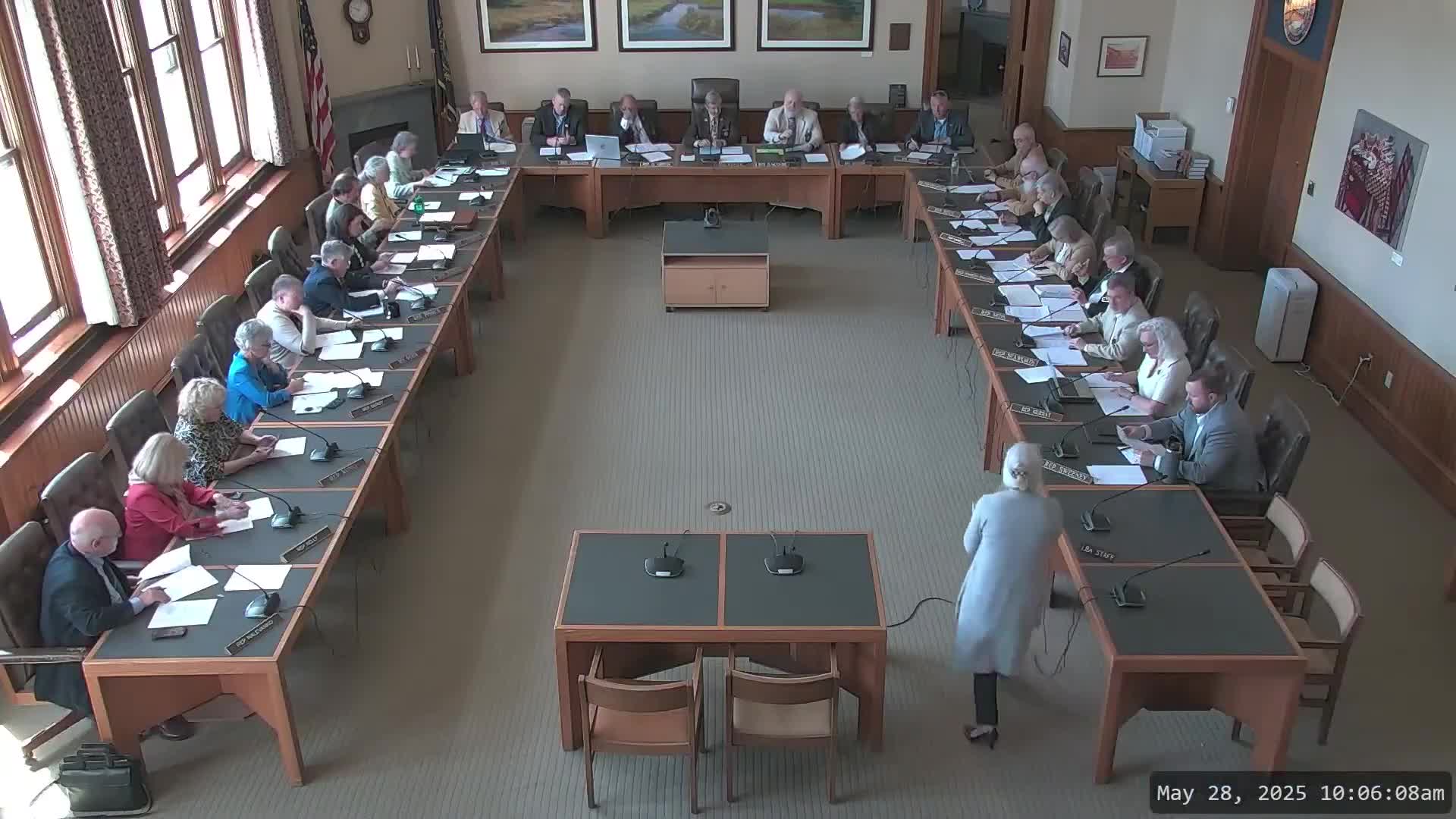 Finance committee adopts amendment to shorten and delay permit-delay reporting requirement