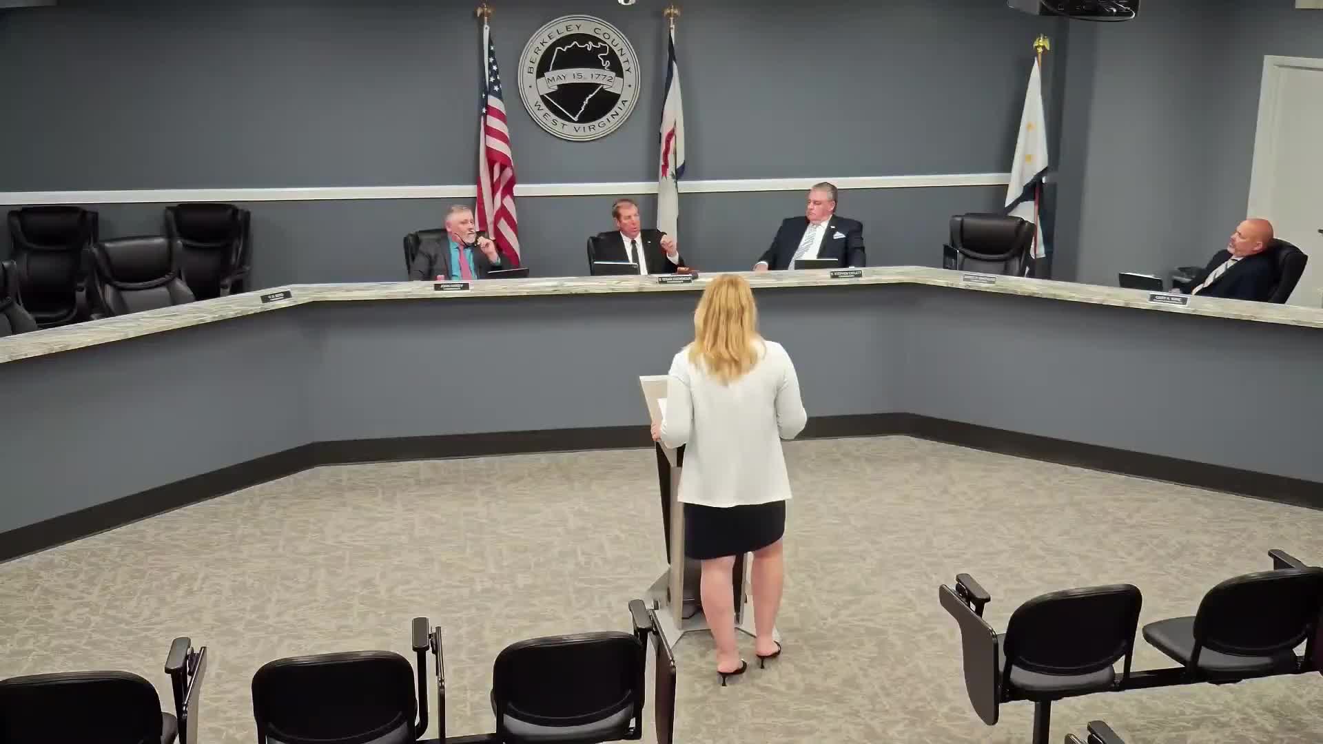 Commission sets July hearing to expand North TIF district, approves furniture and computer bids and waives water district bond