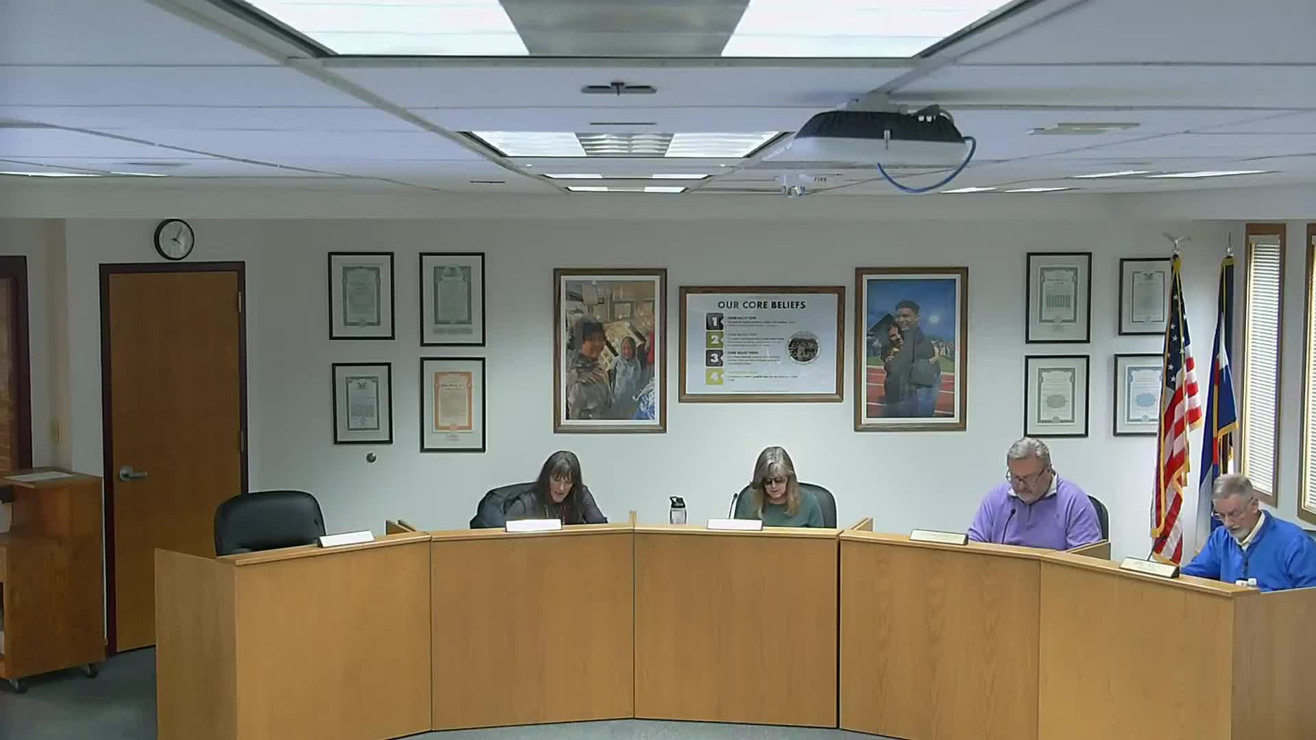 District finance presentation shows modest new state money, projects deficit spending and cuts risk