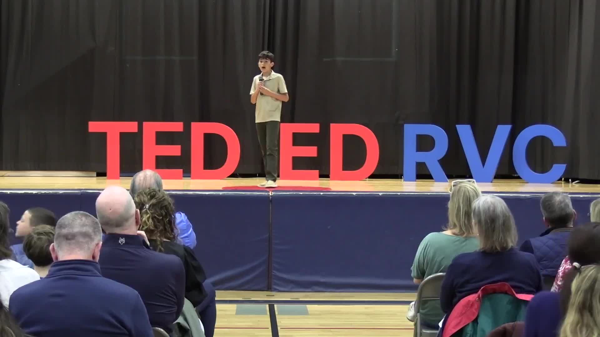 Student highlights the value of asking better questions, quotes Einstein