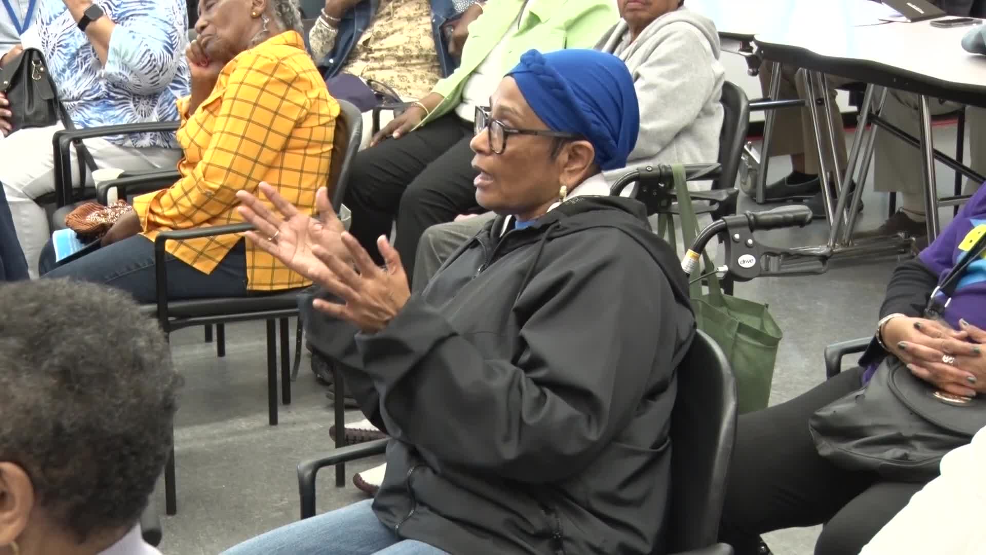 Community member criticizes bus stop placements and advocates for safer transit options