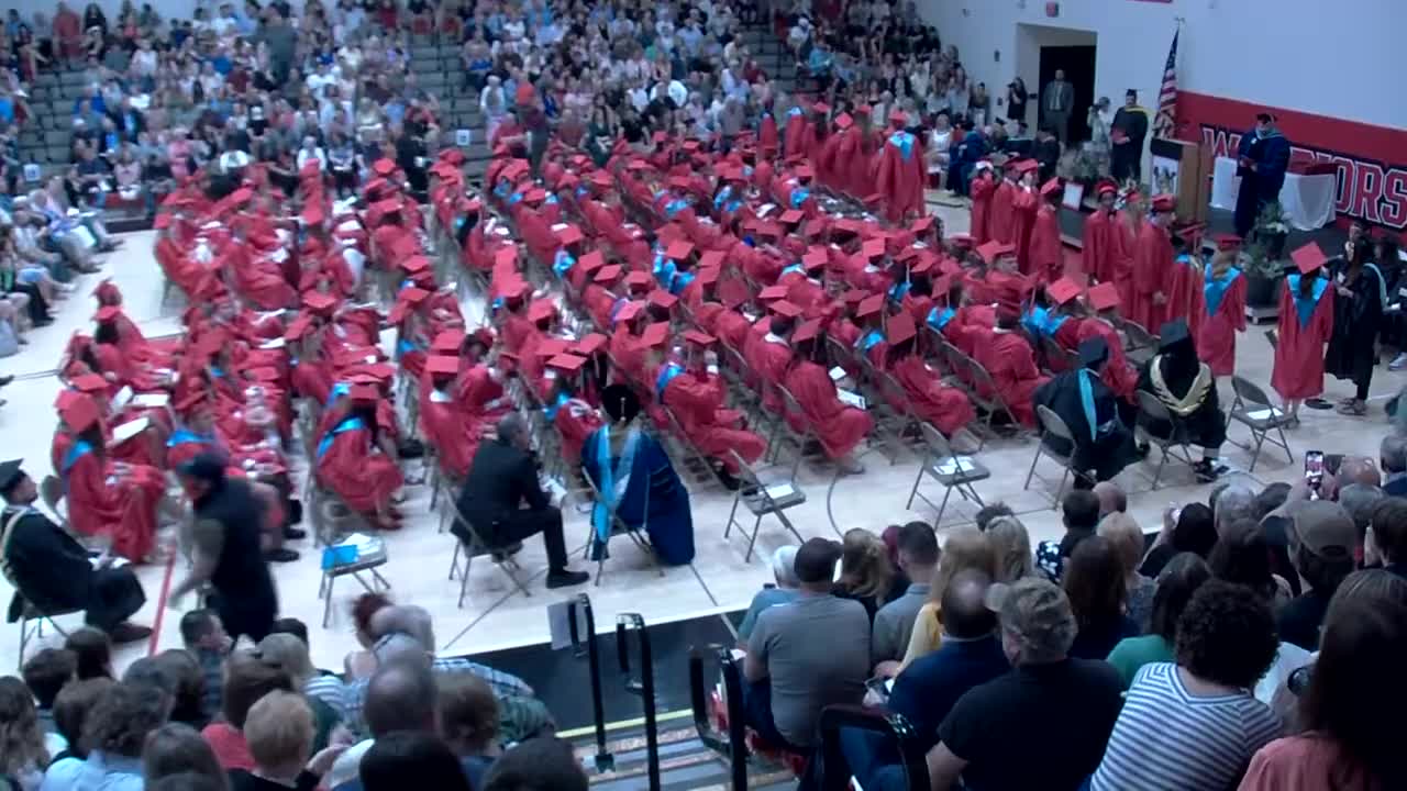 Graduation ceremony honors students earning summa and magna cum laude distinctions