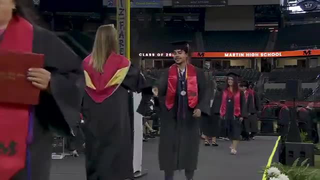 Graduation ceremony honors numerous students including Juan Manuel Ramirez and Victor Salazar