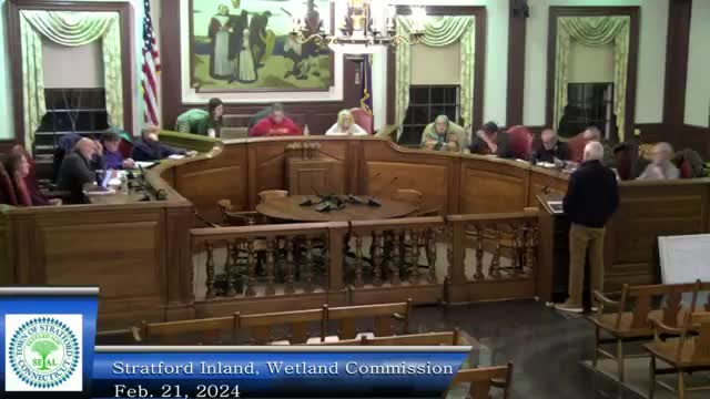 Restaurant enhances outdoor space with trees and multi-level patios on Holy Lane