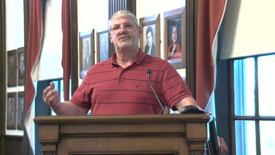 Community member urges board to deny auction business special use permit on Grove Avenue