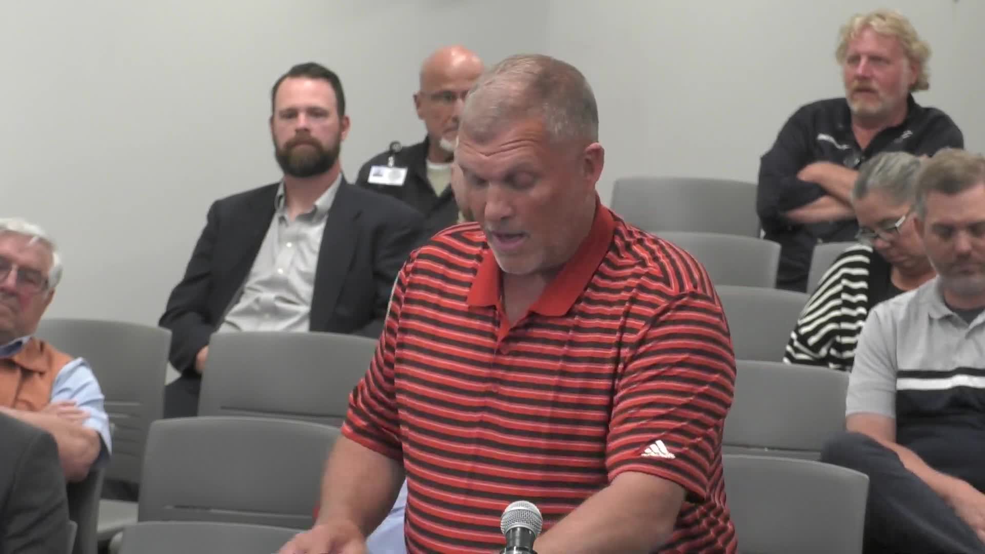 Resident criticizes zoning board for ignoring approved site plans in redevelopment