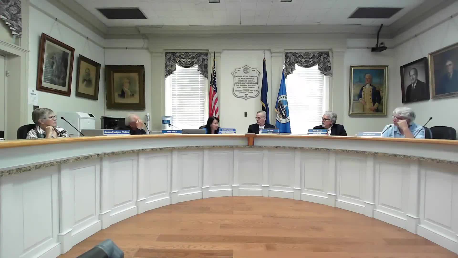 Board declines to pursue regional dispatch presentation after heated debate over public‑safety control