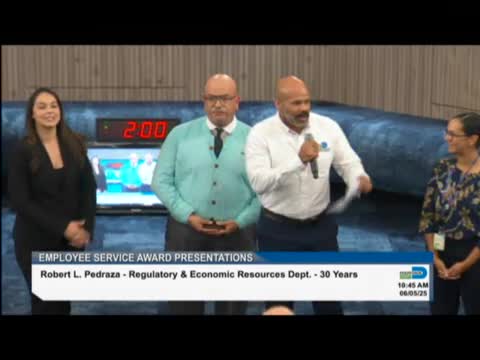 Consumer Protection Supervisor Robert Pedraza honored for 30 years of dedicated service