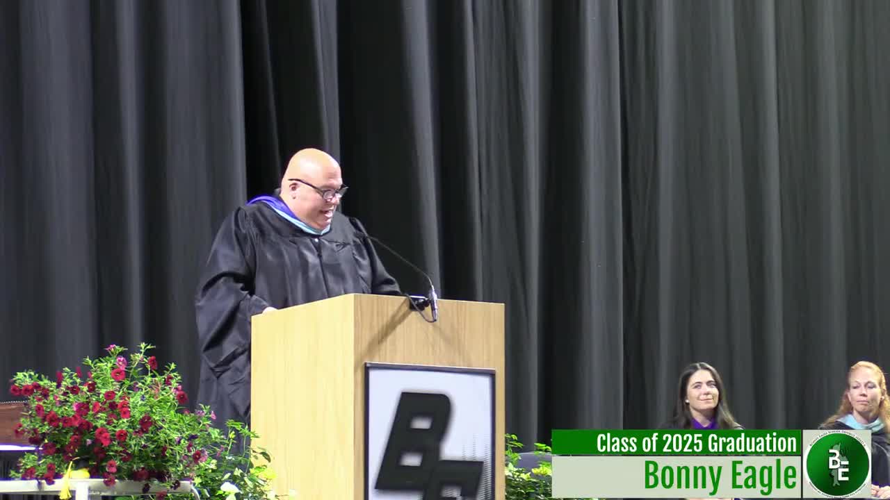 Senator Libby presents legislative sentiment to Salutatorian Sofia Guadiano at Bonneagle graduation