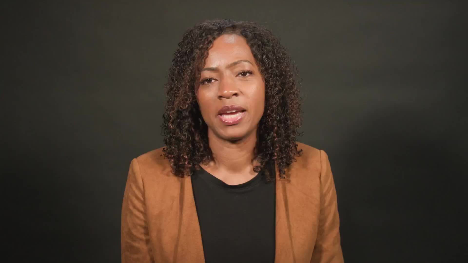 Presenter outlines signs of workplace hate speech and steps for targets and bystanders