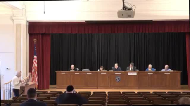 Residents express flooding concerns over proposed townhouse project