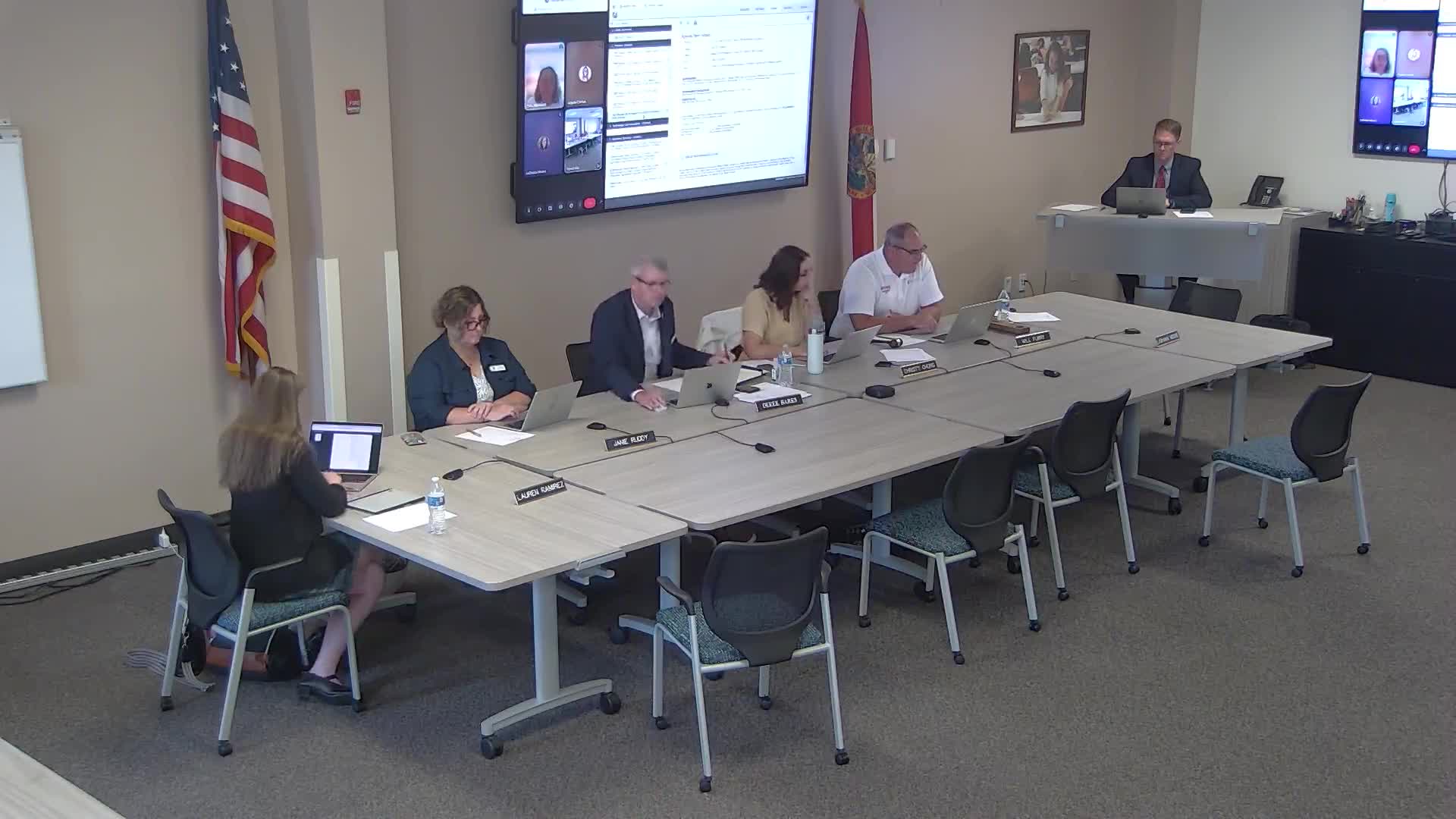 Board reviews Flagler Youth Orchestra contract edits and renews dual‑enrollment agreements with UF and Daytona State