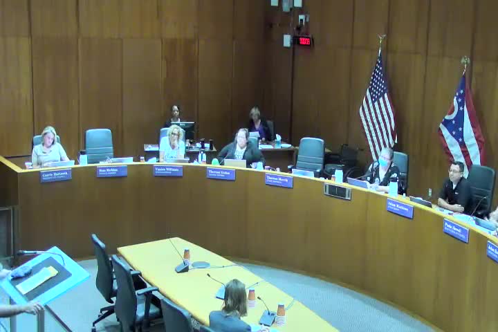Parking Lot Attendant opposes caging proposal citing safety and visibility concerns