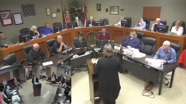 City staff backs rezoning 20.52 acres for future library, duplexes; traffic, sidewalks to be handled at final plan