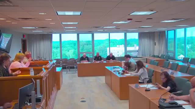 Committee approves contract amendment for offender-management system; members ask about mailed community notifications