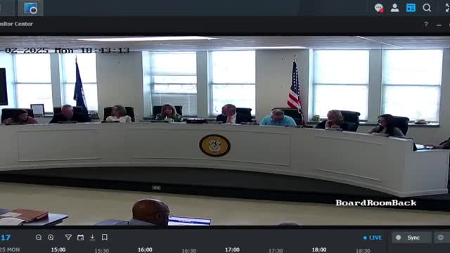 Board praises monthly invoice review after recurring billing errors; central‑office positions and carryover funds discussed