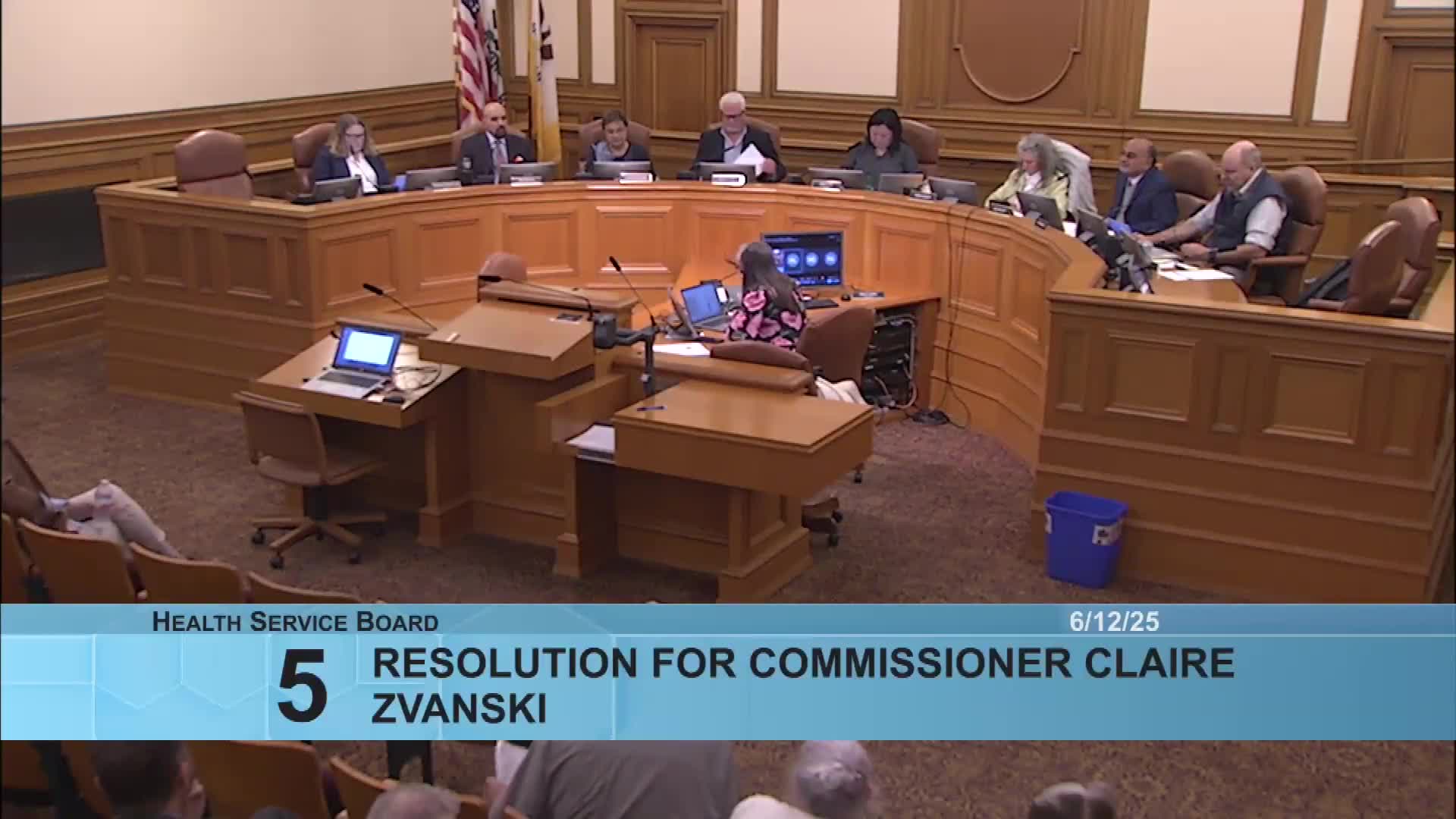 Commissioners honor Claire's legacy during roll call vote