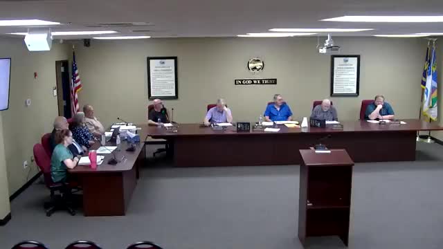 County commissioner debates proposed $20,000 budget increase amidst cuts to other departments