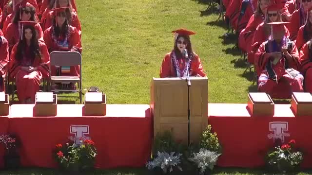 Cherokee High graduation speech emphasizes building bridges in a divided world