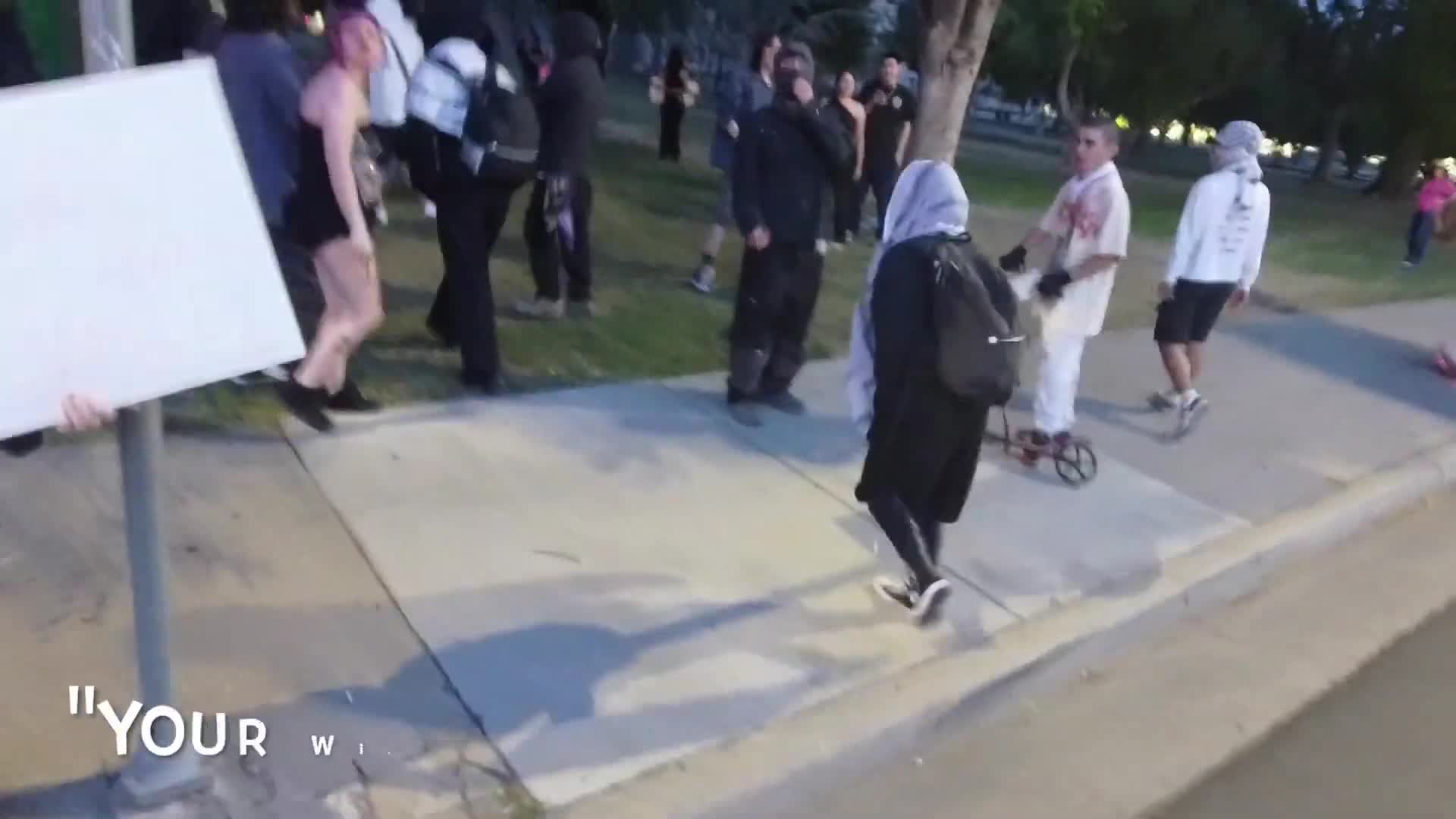 Protesters Clash Over Free Speech at Local Rally