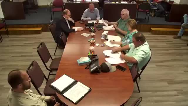 City Council debates shift from universal permits to individual contractor licenses