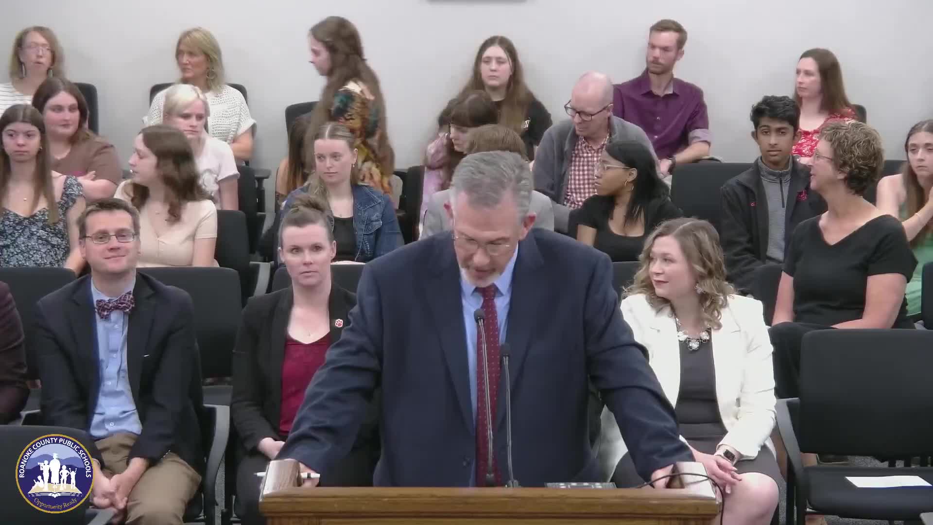 School board approves pay‑plan increases and a $4.6 million budget revision; dual‑enrollment fee reinstated