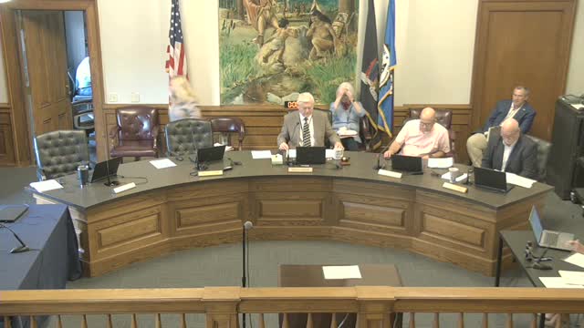 Commissioners approve agreement for four charging stations at Woodlawn Parking Garage