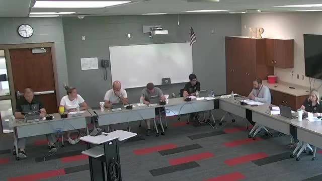 North Polk School Board approves $500,000 loan and cross country arch donation