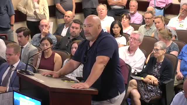 Civil Engineer Christie Bridal addresses infrastructure concerns at commission meeting