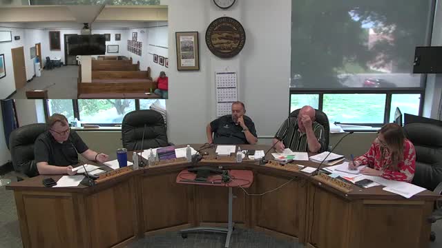 Commissioners approve motion to raise county attorney’s pay; salary figures in transcript inconsistent