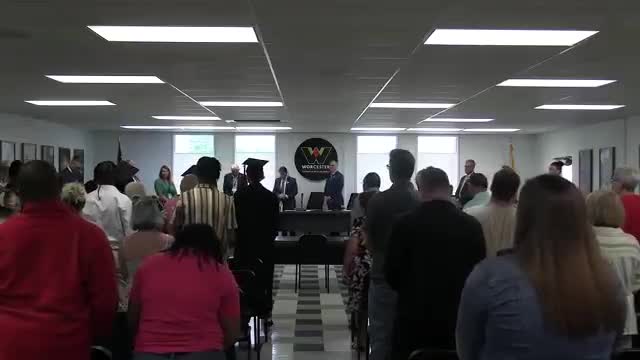 Superintendent Lou Taylor bids farewell during final meeting and provides closing blessings