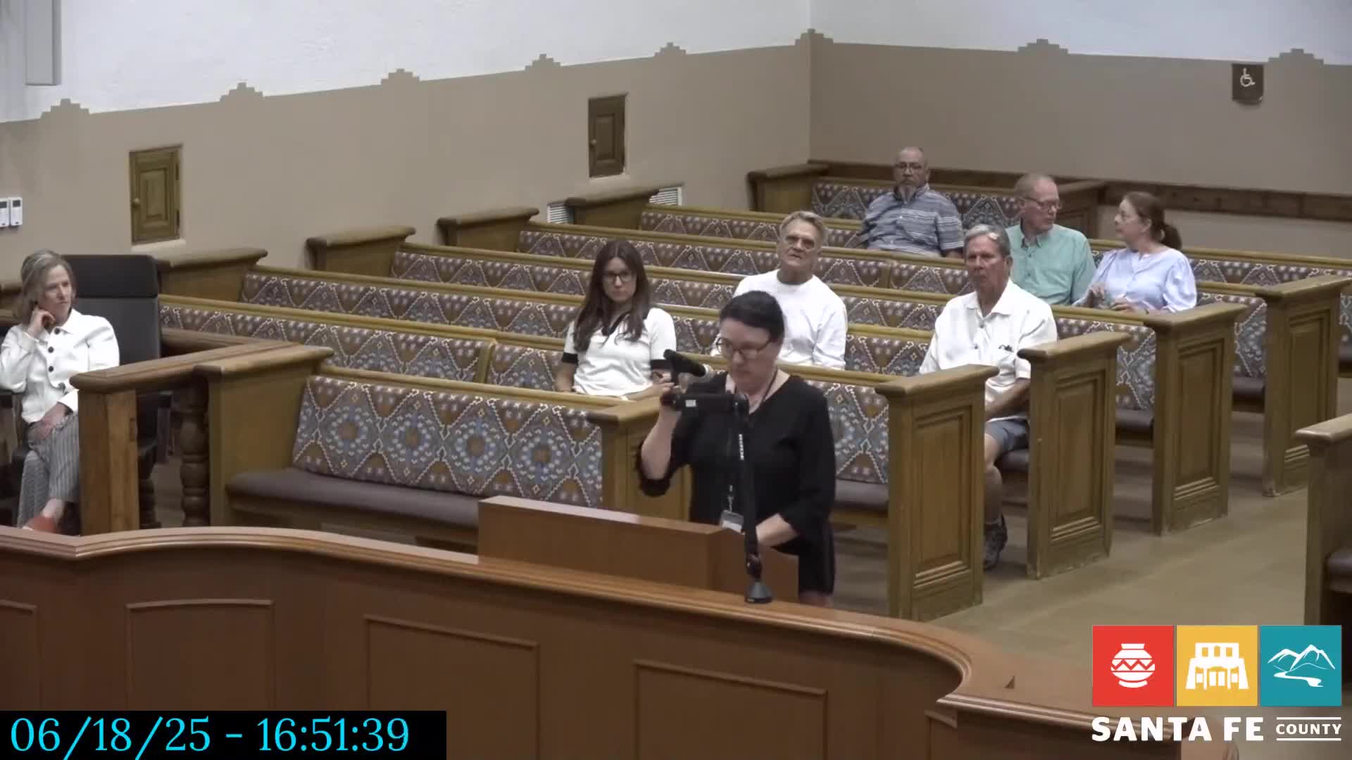 Commission grants variance to allow separate septic system where geology prevents connection