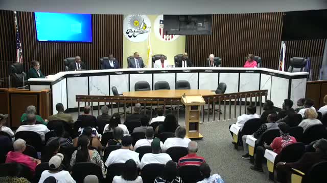 Reverend Alvin Moses leads prayer to honor new Port Arthur mayor Charlotte Moses