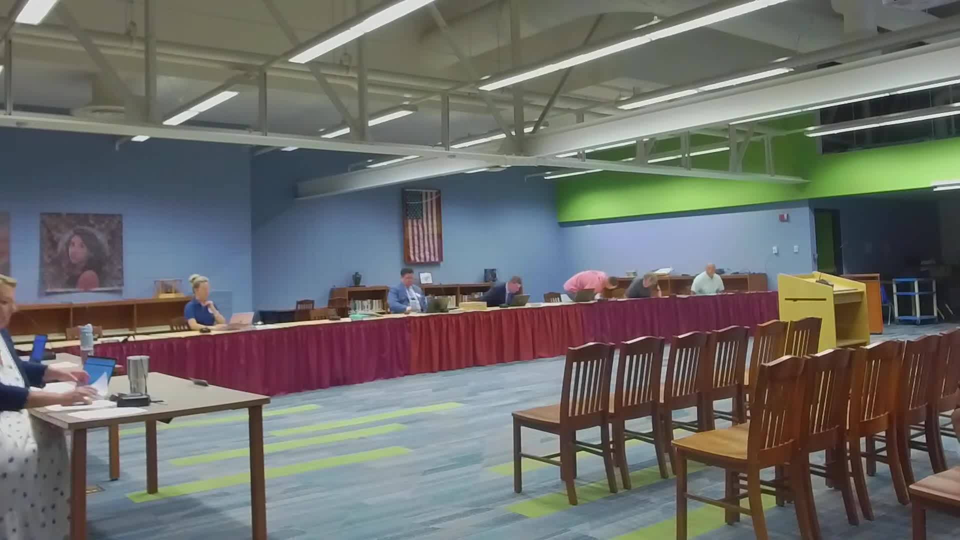 City officials conduct roll call during council meeting