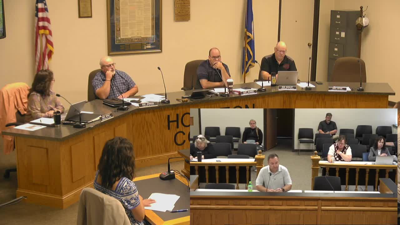 County officials debate flying old flag versus newly adopted design