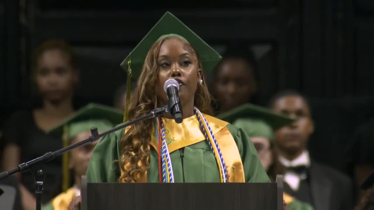 Senior Class President Izzy Hartley addresses graduation ceremony attendees