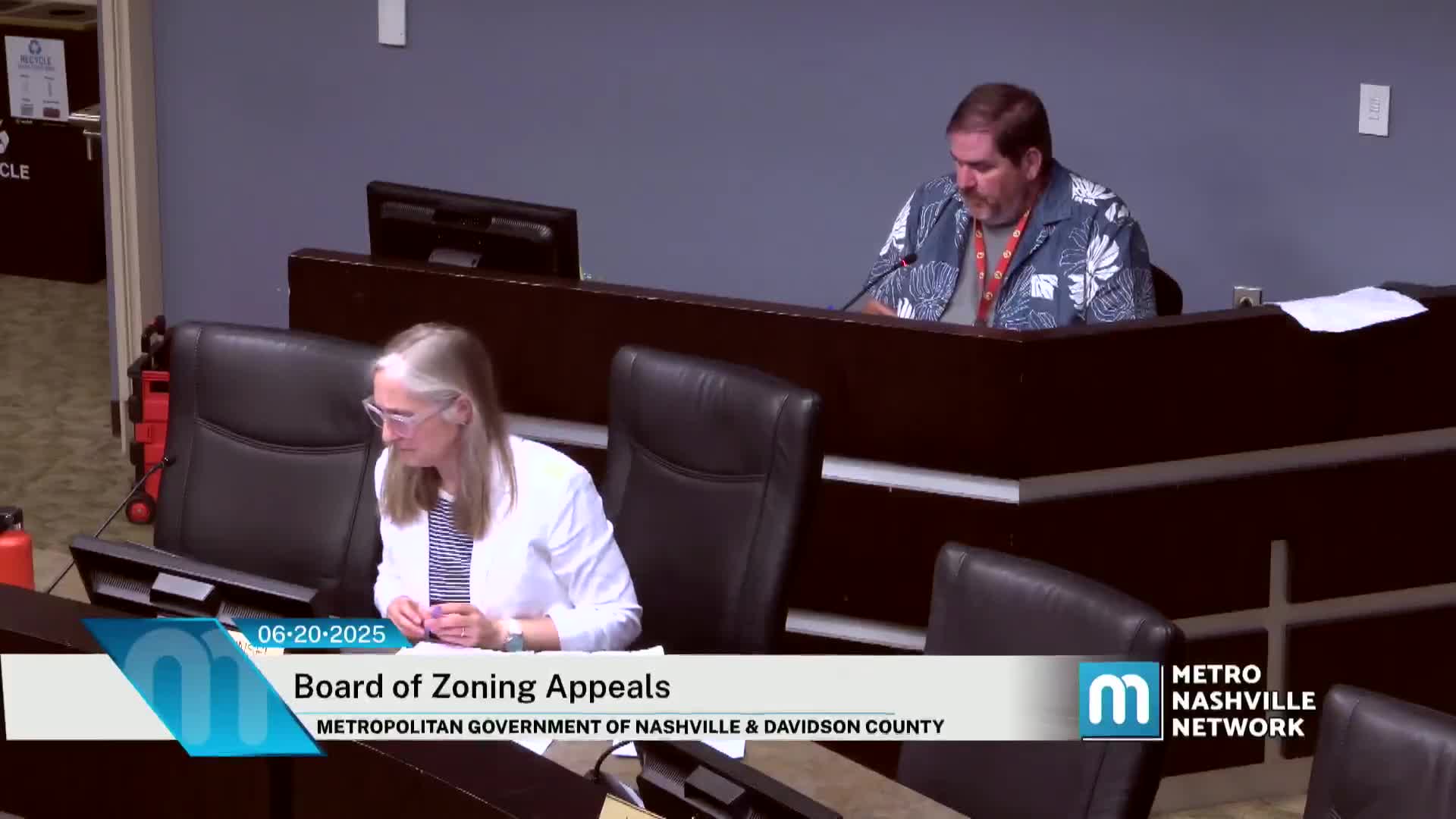 Board grants variance for opaque fence along Nevada Avenue; applicant told to follow up with codes