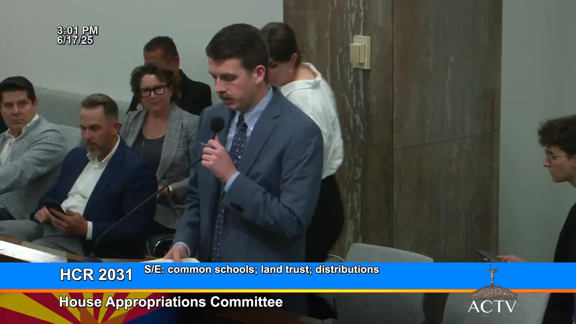 Appropriations committee advances competing measures to lock Prop 123 distribution and direct funds to teacher pay; educators warn of exclusions