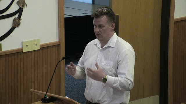 Commissioners discuss wind farm setbacks and public safety measures in rural community