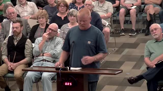 Mike Musick voices concerns over neighborhood rezoning at city meeting