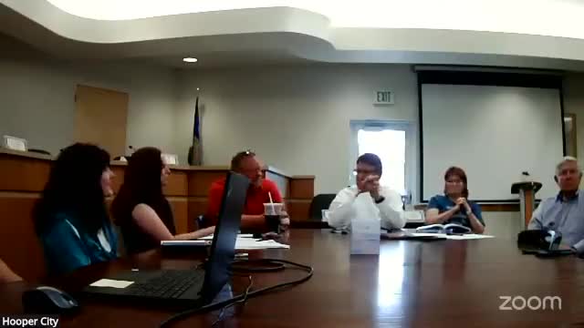 Hooper City Council debates commercial project funding amid financial scrutiny
