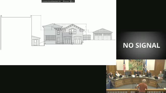 Community member voices concerns over garage project impacting historic trees on George Street
