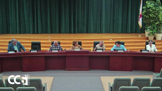 Board to remove state-identified books and consider policy amendment following State Board guidance